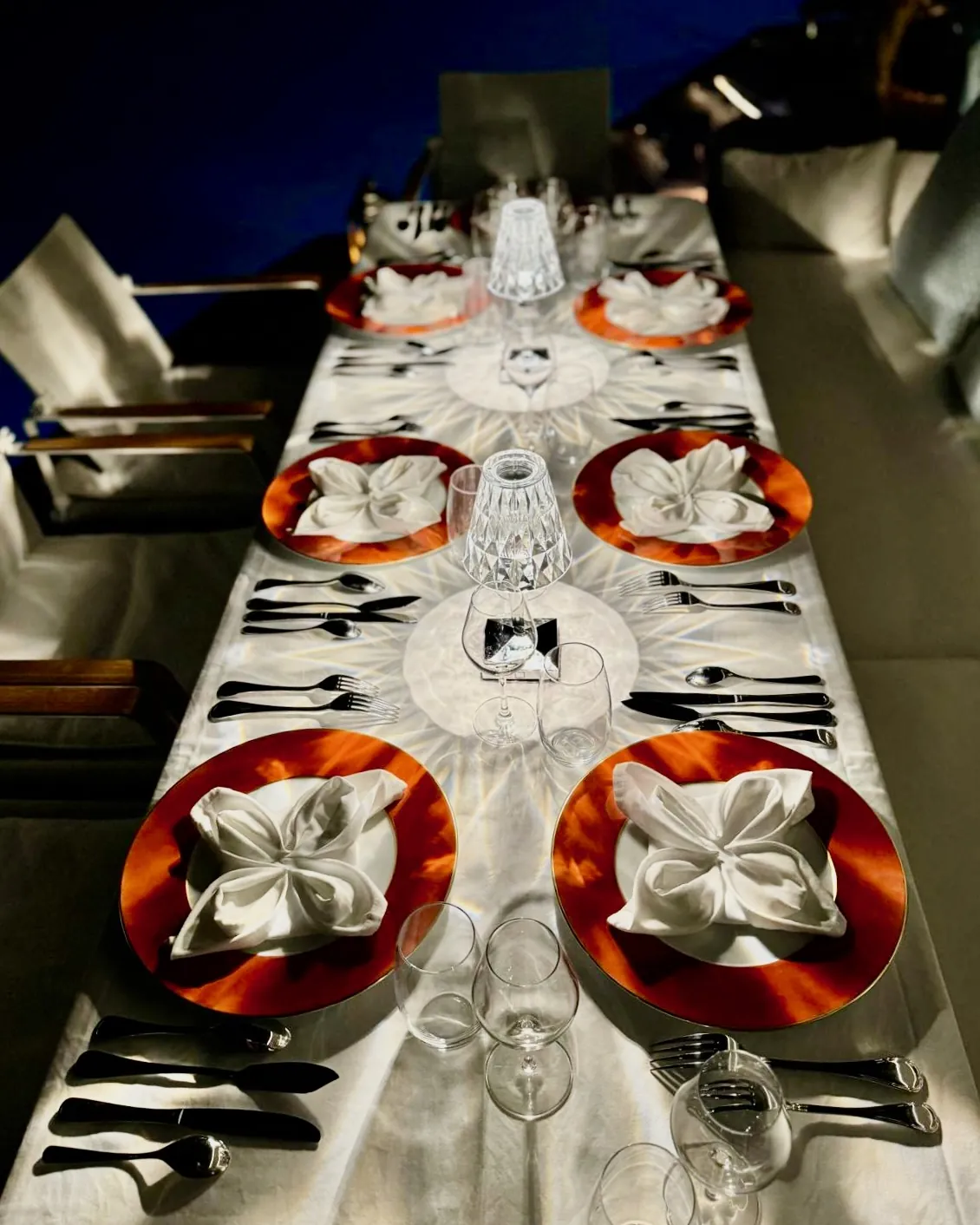Dinner table set for guests on One Planet