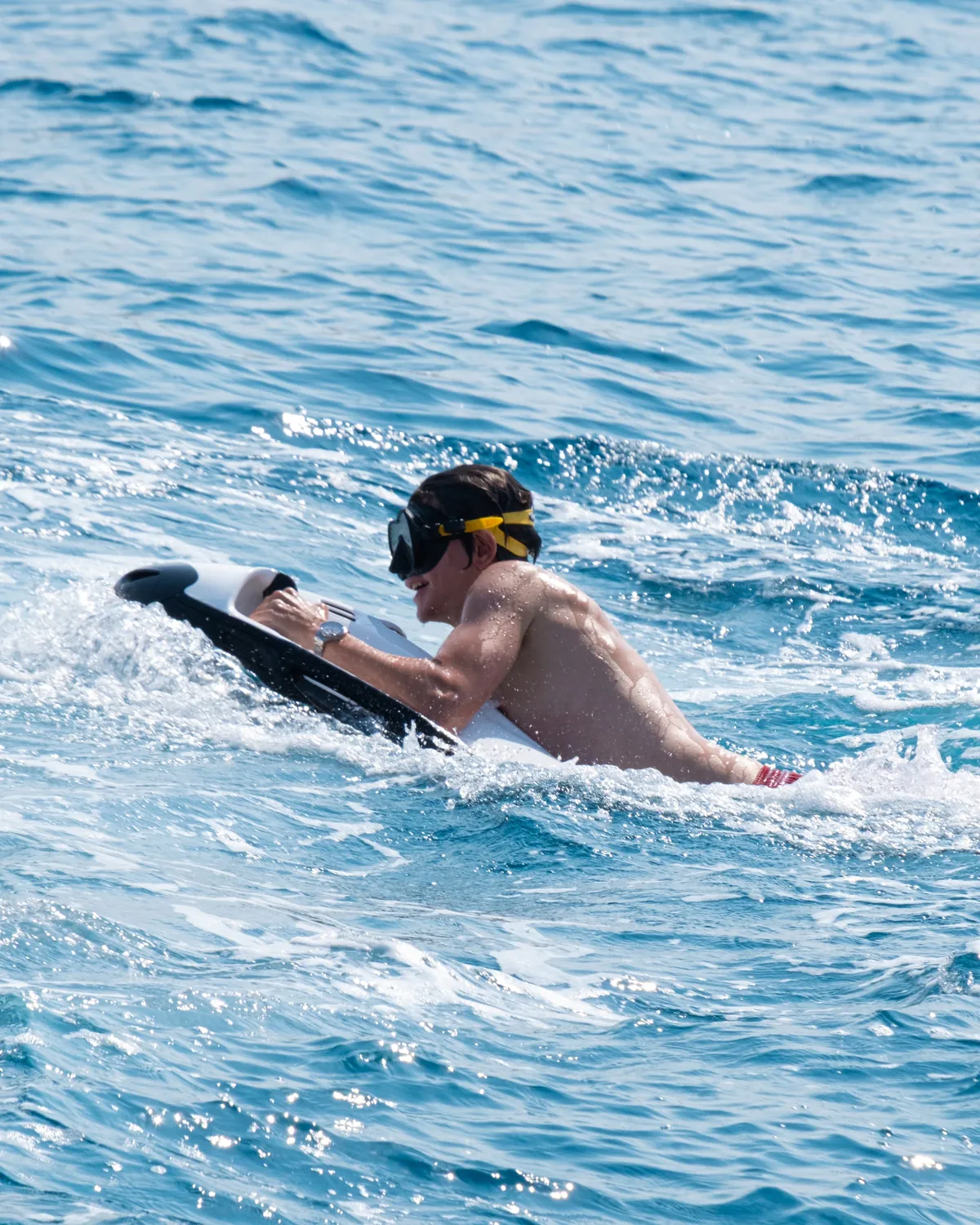 A guest riding a Seabob from One Planet